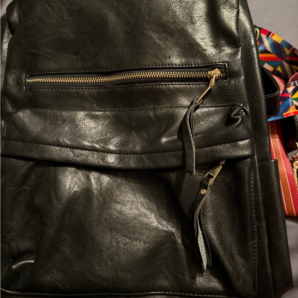 Timeless Black Leather Backpack with Vintage Sheen
